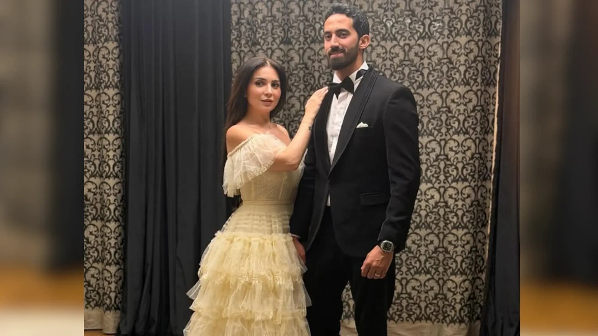 مي عزالدين زوجها