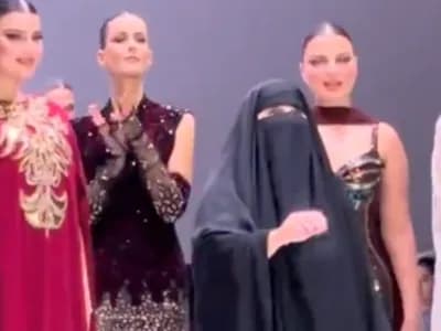 الكويتية ابتسام الهاجري تخطف الأنظار بظهورها بالنقاب على منصة الرياض للازياء!.. فيديو