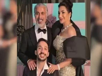 لجين عمران في اول ظهور مع زوجها سيف المنصوري ونجلها سمير البيات